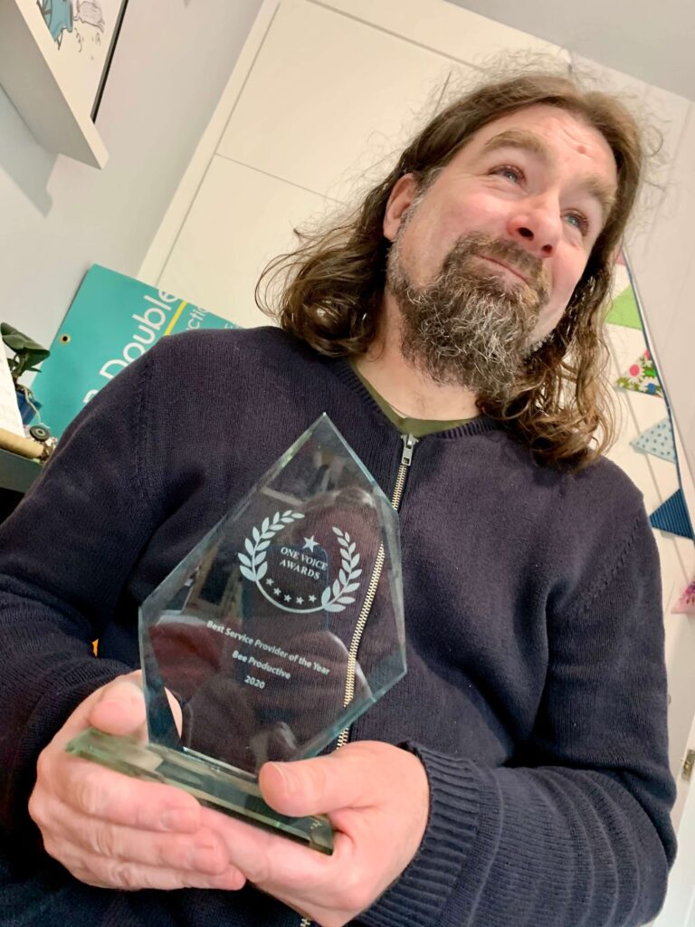 Rob Bee with his award