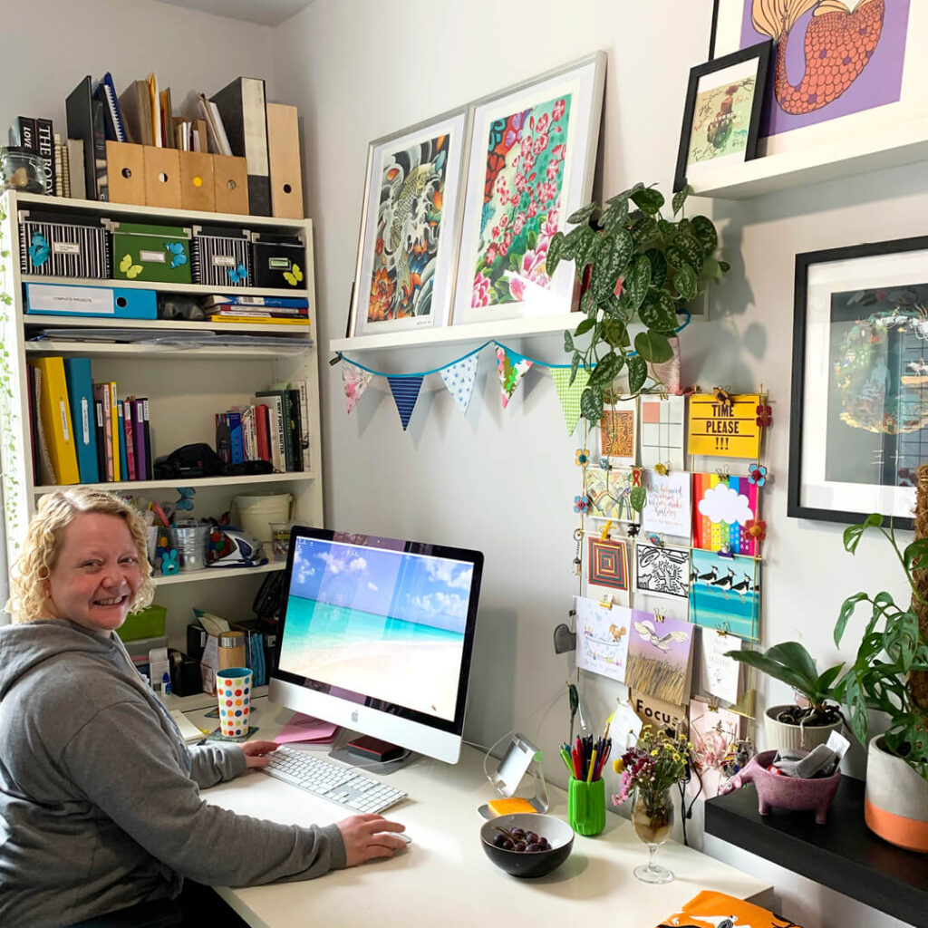 Helen sat at her desk