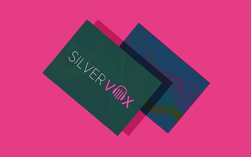 SilverVOX logo - pink and silver logo on dark green.