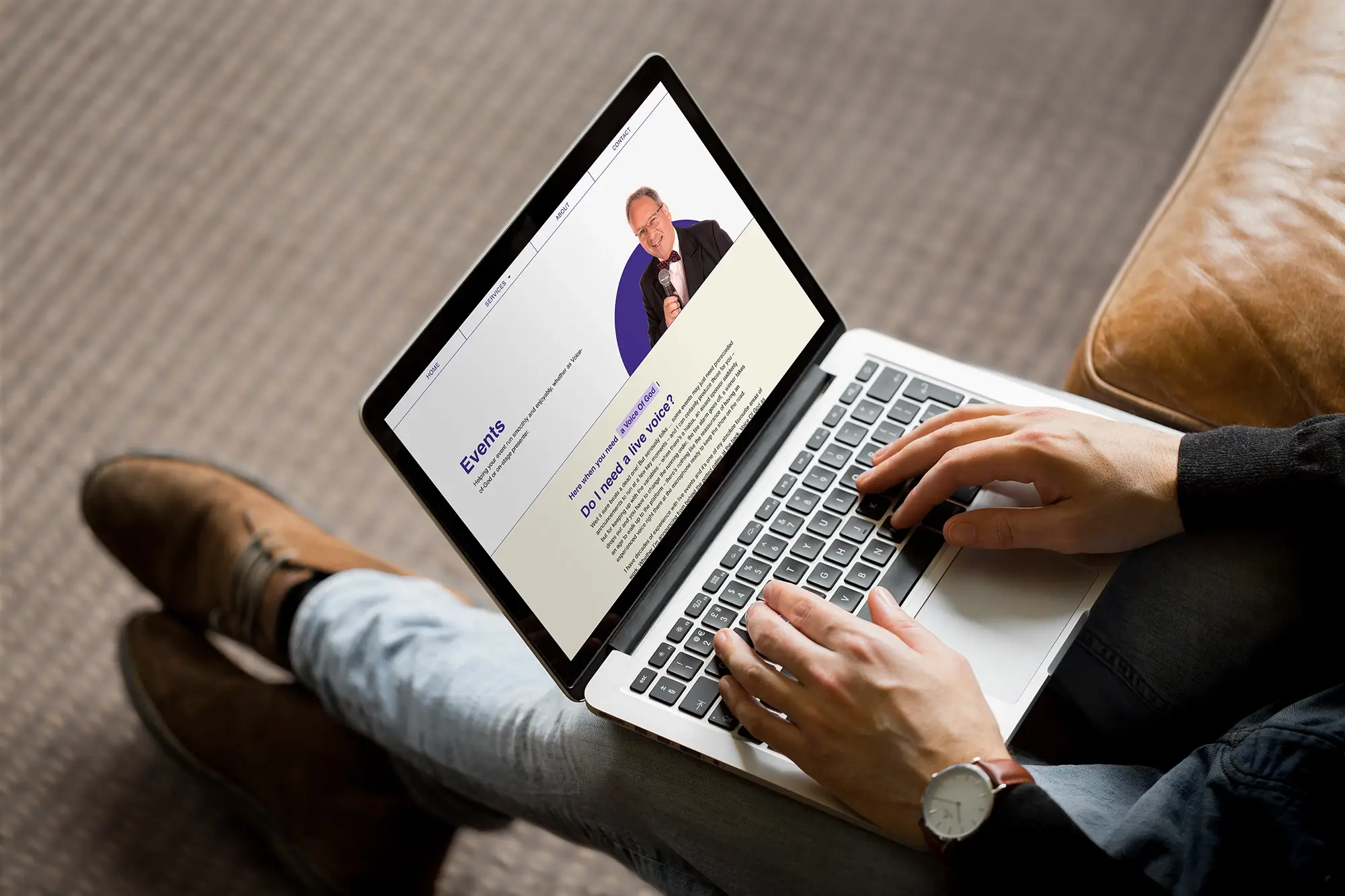 Presenter and Voice Artist Charles Nove's website events services shown on a laptop that a man is typing on.